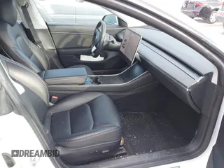 2020 Tesla Model 3 Standard Range Plus with VIN 5YJ3E1EA7LF742973, listed as a IAAI auction lot 41409285 with 48,993 mi miles and . Bid and sale history available at DreamBid. Image 5.