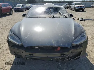 2014 Tesla Model S 60 с VIN 5YJSA1H15EFP49412, выставлен на аукционе Copart как лот 60476835 с пробегом 96 202 миль миль и Списание • Salvage title. История ставок и продаж доступна на DreamBid. Изображение 5.
