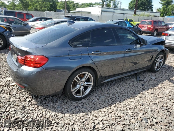 2015 BMW 4 Series 435i xDrive with VIN WBA4B3C51FGV48297, listed as a Copart auction lot 60950394 with 105,509 mi miles and Salvage Title. Bid and sale history available at DreamBid. Image 3.