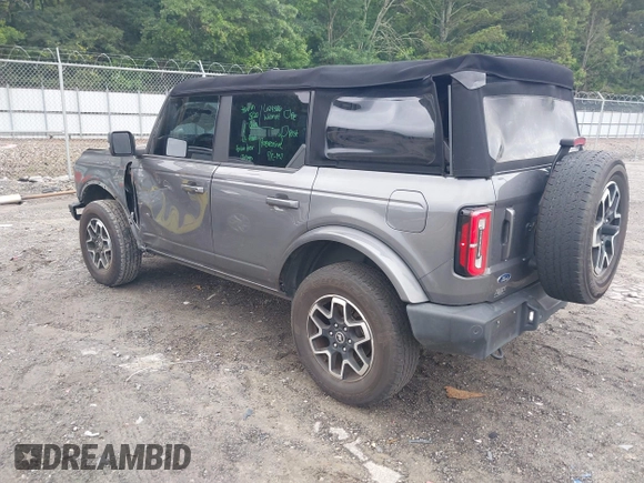2021 Ford Bronco with VIN 1FMDE5DH9MLA62853, listed as a IAAI auction lot 42413256 with 65,000 mi miles and . Bid and sale history available at DreamBid. Image 3.