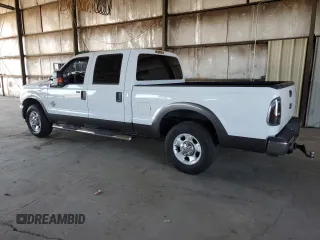 2011 Ford F-250 XL with VIN 1FT7W2AT2BEC57538, listed as a Copart auction lot 64505735 with 153,584 mi miles and Salvage title. Bid and sale history available at DreamBid. Image 2.