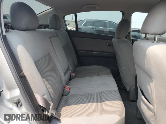 2010 Nissan Sentra S z VIN 3N1AB6AP6AL695976, wystawiony jako Copart lot #59365795 z przebiegiem 144 213 mil mil oraz Szkoda całkowita • Salvage title. Historia ofert i sprzedaży dostępna na DreamBid. Obrazek 10.