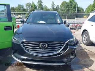 2021 Mazda CX-9 Carbon Edition with VIN JM3TCBDY3M0524241, listed as a IAAI auction lot 42538127 with 50,533 mi miles and . Bid and sale history available at DreamBid. Image 12.