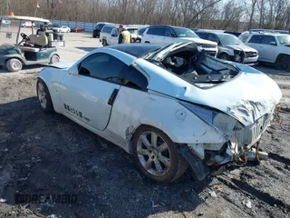2003 Nissan 350Z Enthusiast with VIN JN1AZ34D83T117940, listed as a IAAI auction lot 41842690 with 165,379 mi miles. Bid and sale history available at carsss.com. Image 3.