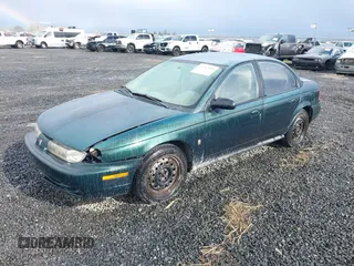 1997 Saturn SL with VIN 1G8ZK5276VZ329694, listed as a IAAI auction lot 41792109 with 208,002 mi miles and . Bid and sale history available at DreamBid. Image 2.