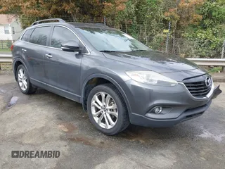 2013 Mazda CX-9 Grand Touring z VIN JM3TB2DA4D0408102, wystawiony jako IAAI lot #41907834 z przebiegiem 97 447 mil mil oraz . Historia ofert i sprzedaży dostępna na DreamBid. Obrazek 1.