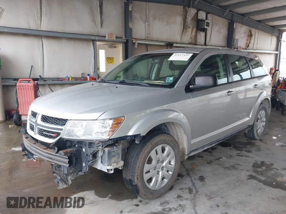 2014 Dodge Journey SE with VIN 3C4PDCAB1ET194066, listed as a IAAI auction lot 42117527 with 184,490 mi miles and . Bid and sale history available at carsss.com. Image 2.