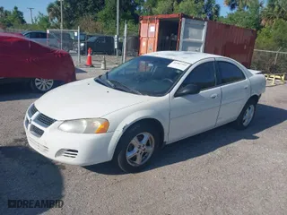 2005 Dodge Stratus Sdn SXT with VIN 1B3EL46X95N568803, listed as a IAAI auction lot 41467555 with 122,610 mi miles. Bid and sale history available at carsss.com. Image 2.