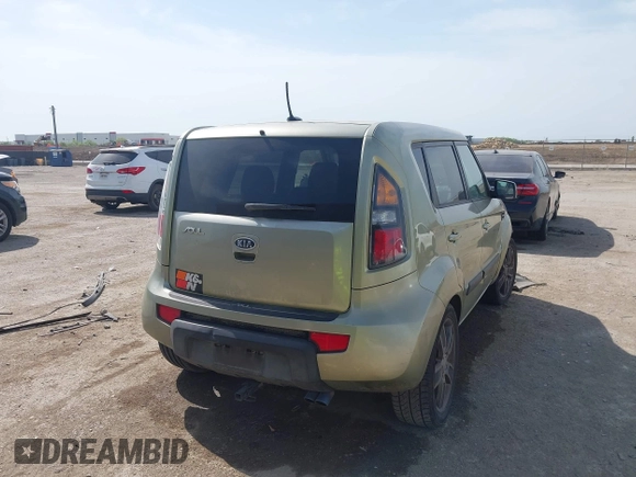 2011 Kia Soul + with VIN KNDJT2A28B7203204, listed as a IAAI auction lot 42028948 with 207,372 mi miles. Bid and sale history available at carsss.com. Image 4.