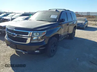 2017 Chevrolet Tahoe LT with VIN 1GNSKBKC6HR394138, listed as a IAAI auction lot 41852966 with 130,711 mi miles and . Bid and sale history available at DreamBid. Image 17.
