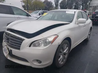 2013 Infiniti M with VIN JN1BY1AP2DM510953, listed as a IAAI auction lot 42157597 with 71,175 mi miles and . Bid and sale history available at DreamBid. Image 2.