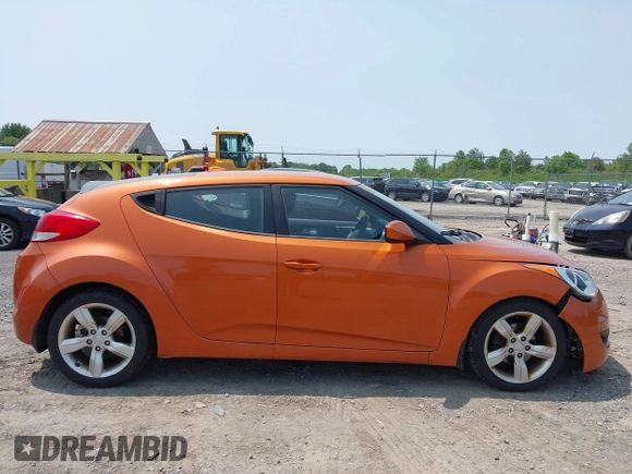 2012 Hyundai Veloster w/Gray Int с VIN KMHTC6AD0CU043402, выставлен на аукционе IAAI как лот 42406321 с пробегом 116 734 миль миль и . История ставок и продаж доступна на DreamBid. Изображение 14.