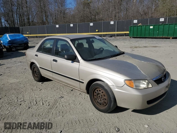 2002 Mazda Protege DX with VIN JM1BJ225520525472, listed as a Copart auction lot 45699915 with 183,457 mi miles and Salvage Title. Bid and sale history available at DreamBid. Image 4.