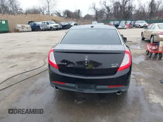 2014 Lincoln MKS with VIN 1LNHL9EK7EG609329, listed as a IAAI auction lot 41555819 with 89,849 mi miles. Bid and sale history available at carsss.com. Image 16.