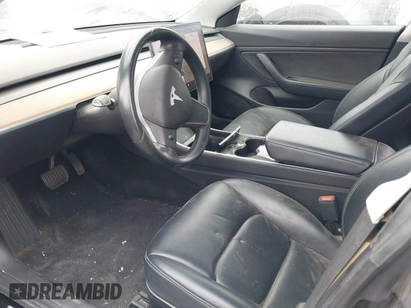 2019 Tesla Model 3 Mid Range with VIN 5YJ3E1EA2KF362048, listed as a IAAI auction lot 40141734 with 70,321 mi miles and . Bid and sale history available at carsss.com. Image 5.