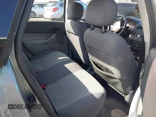 2006 Ford Focus S z VIN 1FAFP34N96W102857, wystawiony jako IAAI lot #42476971 z przebiegiem 125 744 mil mil oraz . Historia ofert i sprzedaży dostępna na DreamBid. Obrazek 8.