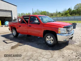 2013 Chevrolet Silverado 1500 LT with VIN 3GCPKSE72DG370233, listed as a Copart auction lot 52311775 with 107,296 mi miles and Salvage Title. Bid and sale history available at DreamBid. Image 4.