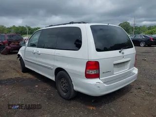 2004 Kia Sedona LX with VIN KNDUP131446493787, listed as a IAAI auction lot 40004348 with 168,374 mi miles. Bid and sale history available at carsss.com. Image 3.
