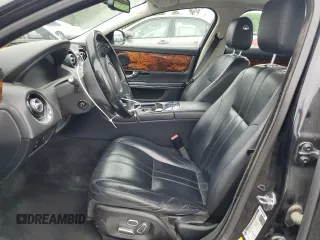 2013 Jaguar XJ с VIN SAJWJ1CD8D8V52463, выставлен на аукционе Copart как лот 61772115 с пробегом 123 899 миль миль и Чистый • Clean title. История ставок и продаж доступна на DreamBid. Изображение 7.