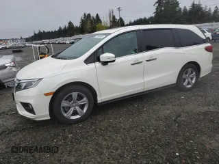2018 Honda Odyssey EX-L with VIN 5FNRL6H75JB112153, listed as a Copart auction lot 51984465 with 156,082 mi miles and Salvage Title. Bid and sale history available at carsss.com. Image 1.
