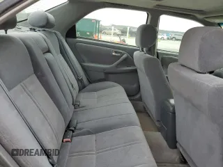 2001 Toyota Camry CE z VIN JT2BG22K210600687, wystawiony jako Copart lot #48807225 z przebiegiem 307 479 mil mil oraz Szkoda całkowita • Salvage title. Historia ofert i sprzedaży dostępna na DreamBid. Obrazek 10.