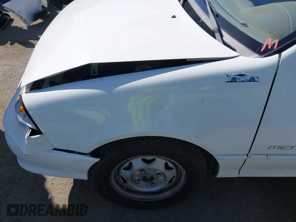 1992 Geo Metro z VIN JG1MR3364NK213871, wystawiony jako IAAI lot #41719350 z przebiegiem 22 589 mil mil oraz . Historia ofert i sprzedaży dostępna na DreamBid. Obrazek 17.