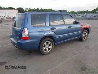 2007 Subaru Forester X with VIN JF1SG63617G722723, listed as a IAAI auction lot 42086601 with 204,766 mi miles. Bid and sale history available at carsss.com. Image 4.