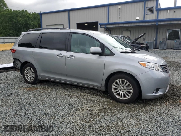 2016 Toyota Sienna XLE with VIN 5TDYK3DC8GS715148, listed as a Copart auction lot 57834045 with 128,769 mi miles and Salvage title. Bid and sale history available at DreamBid. Image 4.