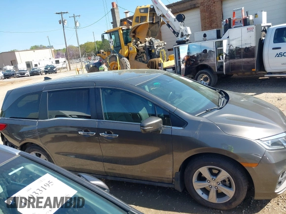 2020 Honda Odyssey EX with VIN 5FNRL6H59LB068868, listed as a IAAI auction lot 41930832 with 64,872 mi miles and . Bid and sale history available at DreamBid. Image 13.