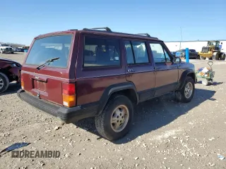 1995 Jeep Cherokee Country with VIN 1J4FT78S9SL617148, listed as a Copart auction lot 43015025 with 196,408 mi miles and Clean title. Bid and sale history available at DreamBid. Image 3.
