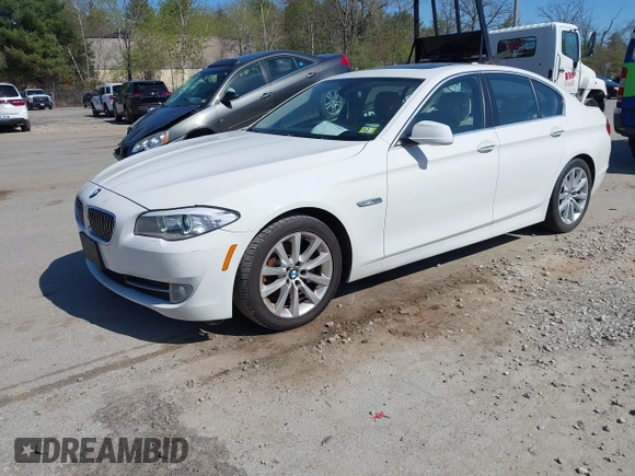 2013 BMW 5 Series 528i xDrive with VIN WBAXH5C50DD108318, listed as a IAAI auction lot 42131197 with 72,119 mi miles. Bid and sale history available at carsss.com. Image 2.