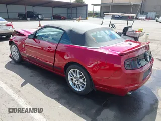 2014 Ford Mustang V6 with VIN 1ZVBP8EM1E5328100, listed as a IAAI auction lot 42075826 with 83,921 mi miles and . Bid and sale history available at DreamBid. Image 3.