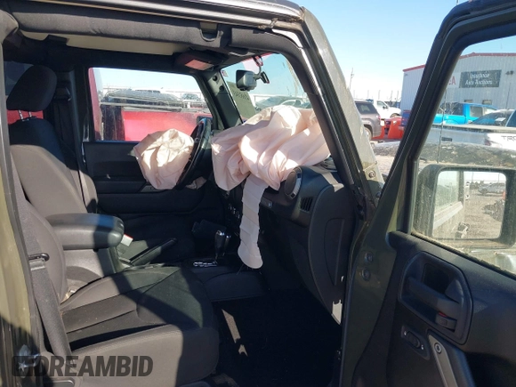 2015 Jeep Wrangler Unlimited Sport with VIN 1C4BJWDG5FL745673, listed as a IAAI auction lot 41681043 with 97,605 mi miles and . Bid and sale history available at DreamBid. Image 5.