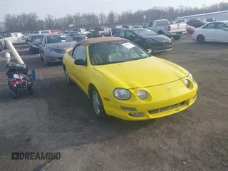 1997 Toyota Celica GT with VIN JT5FG02T6V0043774, listed as a IAAI auction lot 41901176 with 184,129 mi miles. Bid and sale history available at carsss.com. Image 1.