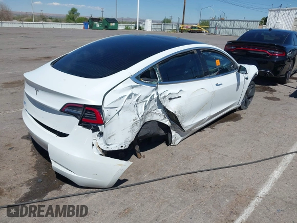 2018 Tesla Model 3 Long Range Battery with VIN 5YJ3E1EA3JF057527, listed as a IAAI auction lot 42072126 with 1 mi miles. Bid and sale history available at carsss.com. Image 4.