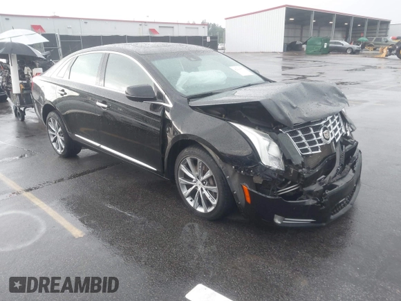2013 Cadillac XTS Premium z VIN 2G61S5S39D9112491, wystawiony jako IAAI lot #42216373 z przebiegiem 145 338 mil mil oraz . Historia ofert i sprzedaży dostępna na DreamBid. Obrazek 1.