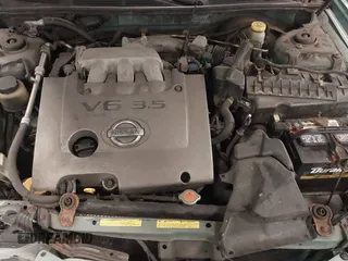 2002 Nissan Maxima GLE z VIN JN1DA31A12T308581, wystawiony jako IAAI lot #41742949 z przebiegiem 116 892 mil mil oraz . Historia ofert i sprzedaży dostępna na DreamBid. Obrazek 10.