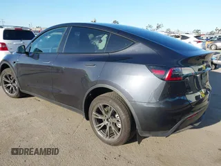 2024 Tesla Model Y with VIN 7SAYGDED5RF103983, listed as a IAAI auction lot 41933836 with 11,398 mi miles and . Bid and sale history available at DreamBid. Image 3.