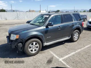 2009 Ford Escape Hybrid z VIN 1FMCU493X9KB03901, wystawiony jako Copart lot #52353675 z przebiegiem 145 444 mil mil oraz Szkoda całkowita • Salvage title. Historia ofert i sprzedaży dostępna na DreamBid. Obrazek 1.