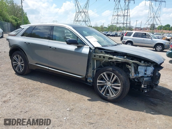 2024 Cadillac LYRIQ Luxury z VIN 1GYKPRRL8RZ128706, wystawiony jako IAAI lot #42161670 z przebiegiem 12 258 mil mil oraz . Historia ofert i sprzedaży dostępna na DreamBid. Obrazek 1.
