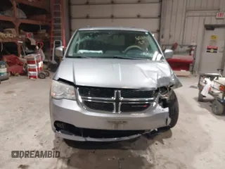 2014 Dodge Grand Caravan SXT z VIN 2C4RDGCGXER263963, wystawiony jako IAAI lot #41956264 z przebiegiem 138 815 mil mil oraz . Historia ofert i sprzedaży dostępna na DreamBid. Obrazek 12.