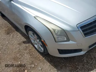 2014 Cadillac ATS Standard RWD with VIN 1G6AA5RA1E0104839, listed as a IAAI auction lot 42383432 with 142,701 mi miles and . Bid and sale history available at DreamBid. Image 6.