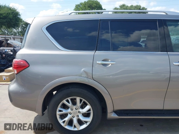 2012 Infiniti QX56 7-passenger z VIN JN8AZ2NF9C9517675, wystawiony jako IAAI lot #42138696 z przebiegiem 129 478 mil mil oraz . Historia ofert i sprzedaży dostępna na DreamBid. Obrazek 21.