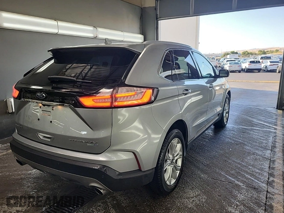 2020 Ford Edge Titanium with VIN 2FMPK4K92LBA30658, listed as a IAAI auction lot 42848998 with 63,460 mi miles and . Bid and sale history available at DreamBid. Image 28.