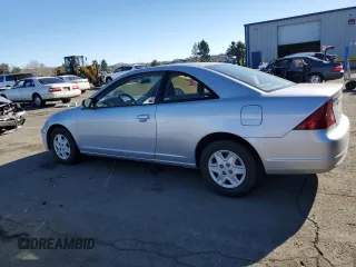 2003 Honda Civic LX with VIN 1HGEM21563L065861, listed as a Copart auction lot 41876845 with 233,101 mi miles and Salvage Title. Bid and sale history available at DreamBid. Image 2.