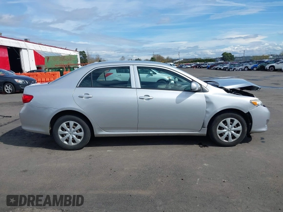 2009 Toyota Corolla with VIN JTDBL40E59J051651, listed as a IAAI auction lot 41874710 with 52,938 mi miles. Bid and sale history available at carsss.com. Image 13.