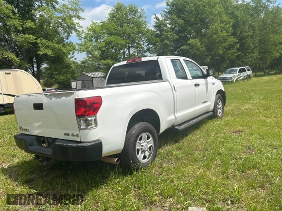 2012 Toyota Tundra 4WD Truck with VIN 5TFUW5F19CX253133, listed as a IAAI auction lot 42147346 with 322,207 mi miles. Bid and sale history available at carsss.com. Image 4.