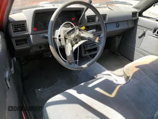 1987 Toyota Pickup с VIN JT4RN70D2H0048566, выставлен на аукционе Copart как лот 52362085 с пробегом 252 452 миль миль и Чистый • Clean title. История ставок и продаж доступна на DreamBid. Изображение 8.