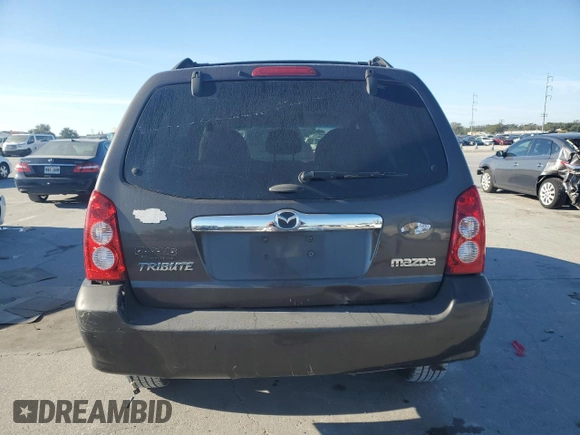 2006 Mazda Tribute S with VIN 4F2YZ04106KM28191, listed as a Copart auction lot 83150994 with 126,536 mi miles and Clean Title. Bid and sale history available at DreamBid. Image 6.