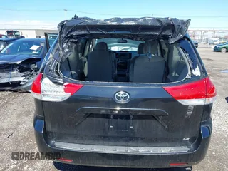 2014 Toyota Sienna LE AAS with VIN 5TDKK3DC4ES445998, listed as a IAAI auction lot 42093872 with 220,943 mi miles. Bid and sale history available at carsss.com. Image 6.